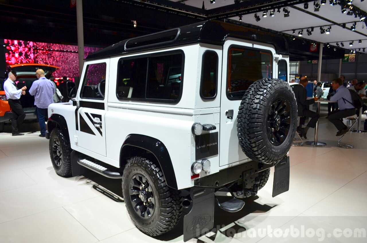Land-Rover-Defender-Black-Pack-rear-three-quarter-for-France-at-the-2014-Paris-Motor-Show