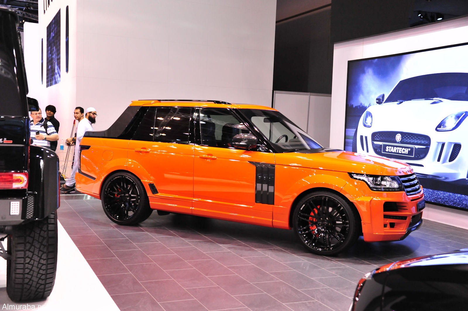 "فيديو" استمتع بـ 10 دقائق من داخل وخارج معرض دبي للسيارات لهذه السنة Dubai Auto Show 1