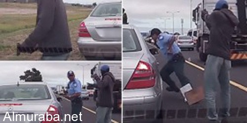 "فيديو" شرطي يستكمل تحرير مخالفة بعد إطلاق النار عليه 5