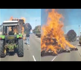 ”فيديو” شاهد لحظة اشتعال النيران بعربة جرار مليئة بالقش
