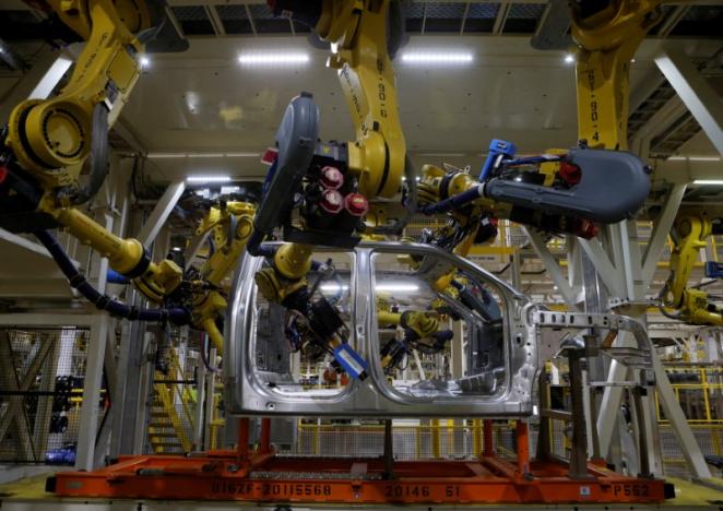 File photo of the aluminium cab of the then all-new 2015 F-150 pick-up truck moves down the robot assembly line at the Ford Rouge Center in Dearborn, Michigan
