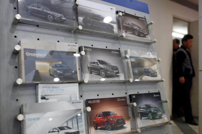 Catalogs of Hyundai Motor's cars are seen at its dealership in Seoul