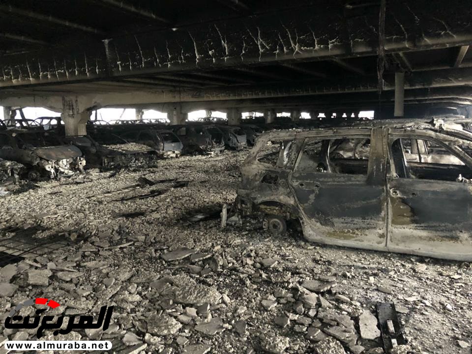 "بالفيديو والصور" 1,400 سيارة دمرت بالكامل بحريق مرآب في ليفربول 13