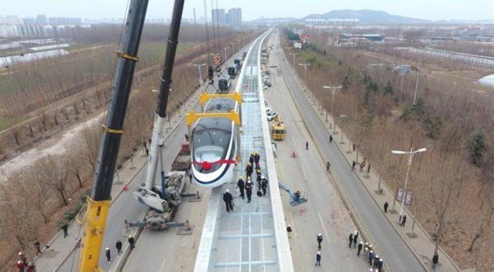 "بالفيديو" شاهد كيف تم بناء سكة قطار في 9 ساعات فقط بالصين 1