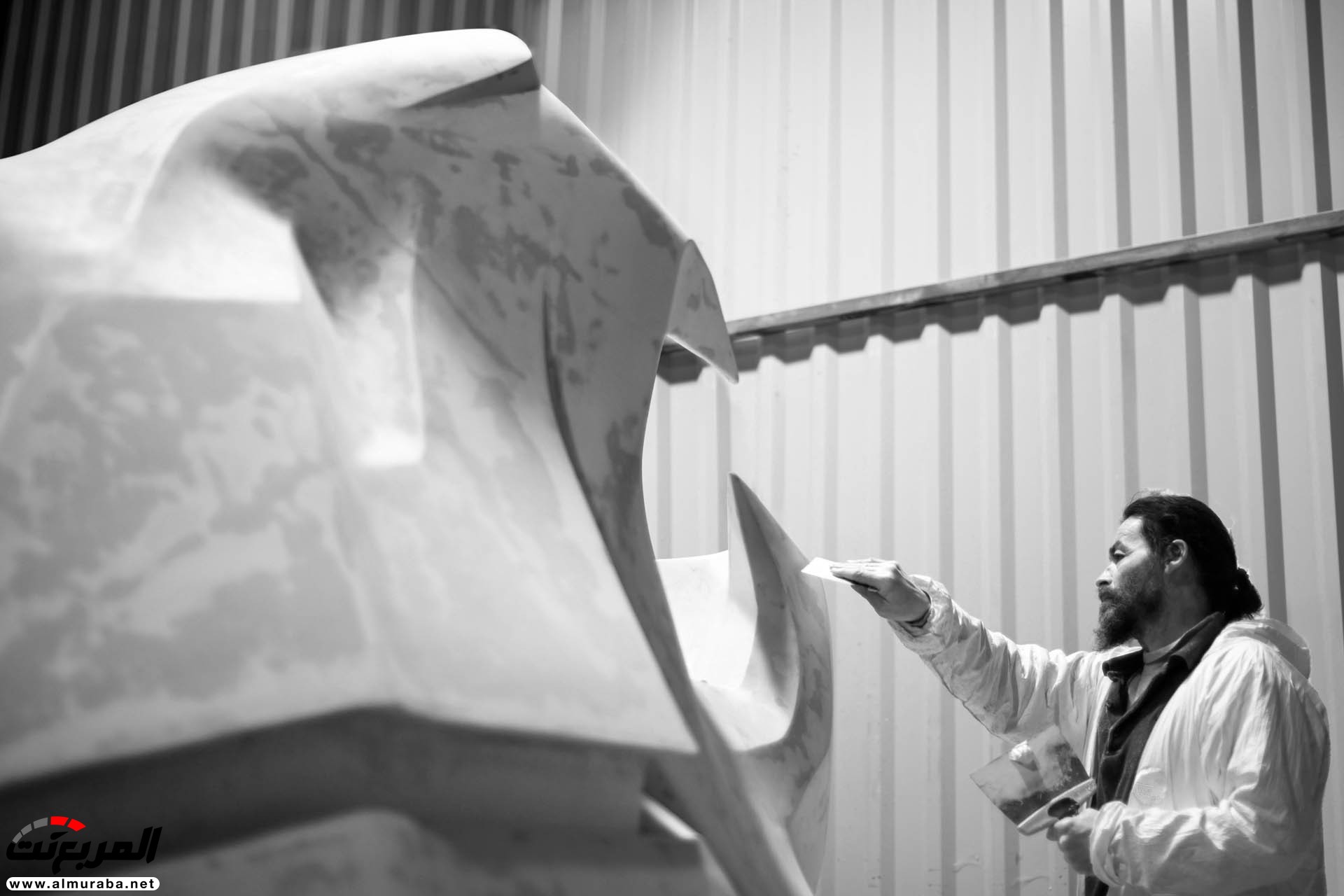 "بالصور" بيجو ستعرض تمثال عملاق على شكل أسد في جنيف 19