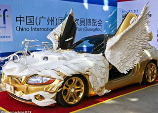 "بالصور" تحويل سيارة بي إم دبليو زد فور إلى تنين ضخم بلون ذهبي في الصين BMW Z4 1