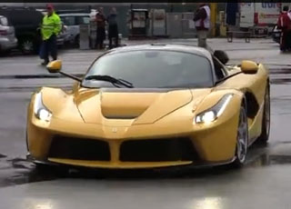 فيراري تطلق سيارتها لافيراري 2014 باللون الأصفر في أحد حلبات السباقات Ferrari LaFerrari